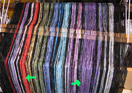 handwoven rainbow shawl on back beam