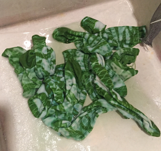 green socks fresh from the dye bath