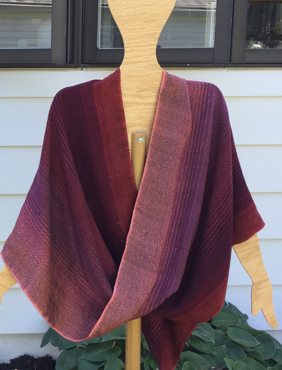 handwoven mobius wrap in reds and black