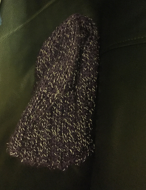 my slouch hat in the dark chair