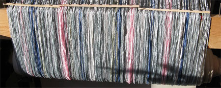 silver striped shawl on loom