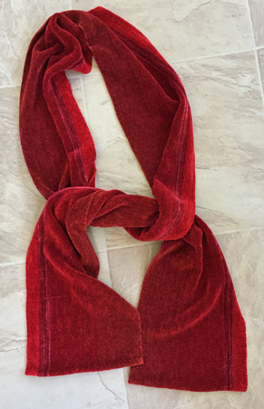 red chenille scarf, tied