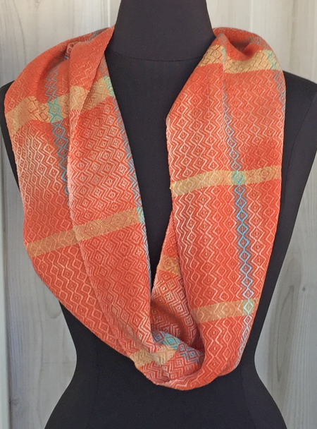 handwoven coral & turquoise cowl, orange weft, down