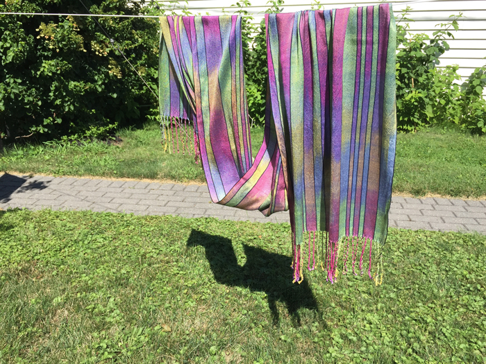 handwoven silk shawl, paint 2 warps, navy weft-front