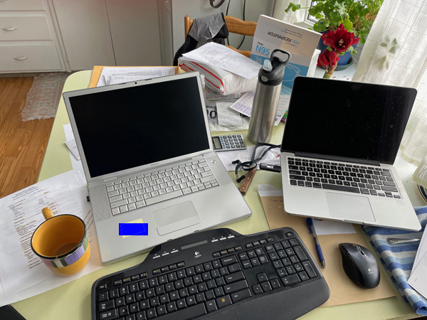 kitchen table with 2 computers