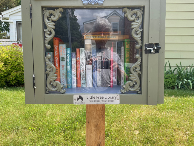 Little Free Library with sign